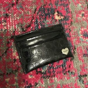Mini black COACH credit card holder